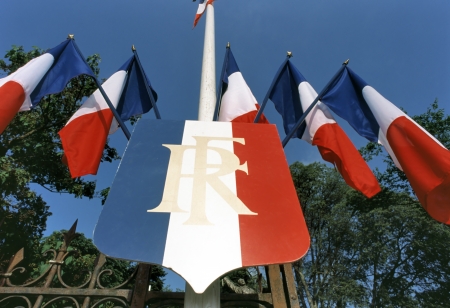 Several French tricolors with the emblem  of the French Republicの写真素材