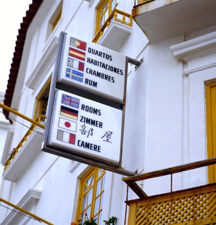 Sign in six languages indicating that there are  rooms for rentの写真素材