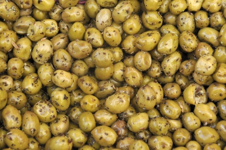 Green olives at a Spanish farmers marketの写真素材