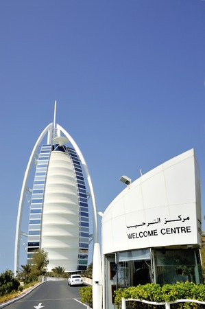 DUBAI, UNITED ARAB EMIRATES - FEBRUARY 8, 2014  View of Burj Al Arab hotel from theentrance gate  Burj Al Arab is one of the Dubai landmark, and one of the worldのeditorial素材