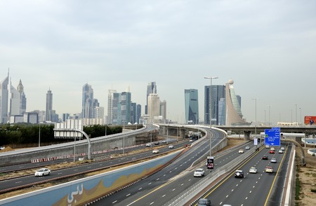Dubai, United Arab Emirates - February 9, 2014  Traffic on highway Sheikh Zayed Road leading to the city center  のeditorial素材
