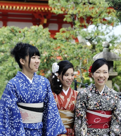 Kyoto, Japan-November 4, 2014;A group of \"one day geisha\" Japanese girls,walking in a temple complex.November 4, 2014 Kyoto,Japanのeditorial素材