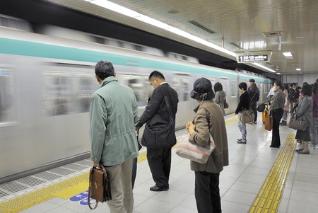 Kyoto,Japan-November 10; People wait at Karasuma Oike Subway Station on November 10, 2014 Kyoto, Japan.のeditorial素材