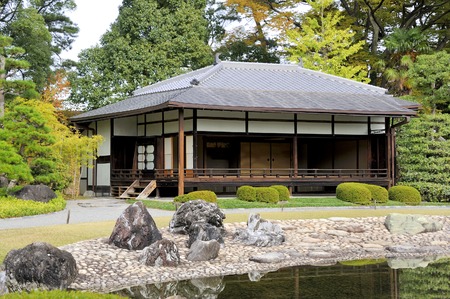 Kyoto,Japan-November 8, 2014; Outside of the Ninomaru Palace at the Nijo Castle extends the Ninomaru Garden a traditional Japanese landscape garden with a large pond and ornamental stones.November 8, 2014, Kyoto, Japanのeditorial素材