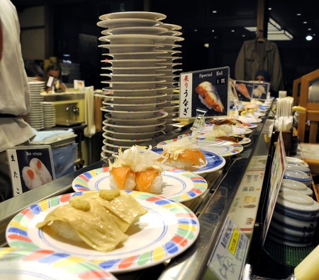 Kyoto, Japan-November 5, 2014; sushi at a conveyor belt at a cheap sushi restaurant. November 5, 2014 Kyoto, Japanのeditorial素材