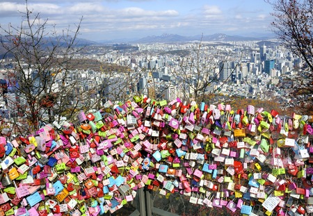The city of Seoul seen from Seoul Tower at Namsan hill with love padlocks at foreground