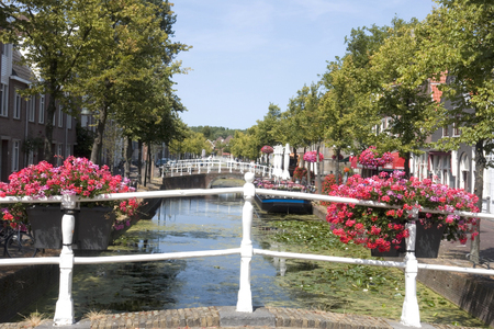Canal and bridges in historical part of Delft, Hollandの写真素材