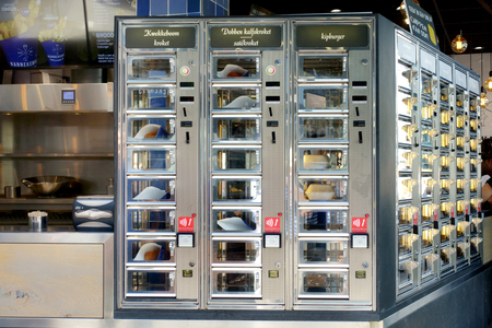 UTRECHT, HOLLAND-AUGUST, 02,2018: Typical Dutch ordering windows with croquette sandwiches and all kind of fast food.Text in English from left to right means: Croquette croquette, Croquette croquette and satay croquette, chicken burgerのeditorial素材