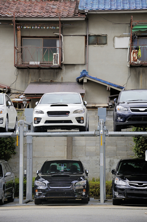 KYOTO,JAPAN-NOVEMBER 5, 2014: Japanese style Multilevel Car Parking System to use as much parking space as possibleのeditorial素材