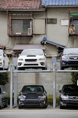 KYOTO,JAPAN-NOVEMBER 5, 2014: Japanese style Multilevel Car Parking System to use as much parking space as possibleのeditorial素材