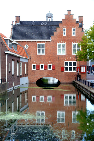 Back of former city hall (anno 1622) in old town or Oud-Beijerland with canal, Hoeksche Waard, South Holland, Netherlandsのeditorial素材