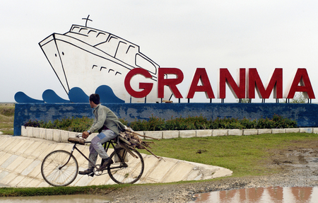 BAYAMO, CUBA- MAY 09, 2016: Biker in front of the Granma memorial. Granma is the yacht that was used to transport the Cuban Cuban Revolution from Cuba to Cuba in 1956 for the purpose of overthrowing the regime.のeditorial素材