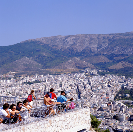 ATHENS, GREECE - AUGUST 16,2015: Tourists looking at the city from Lycabettus Hill, Greece, Athens.のeditorial素材