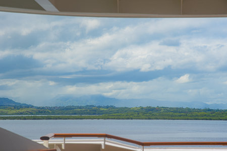 View from the cruise ship on the river and blue sky with clouds, Lautoka, Fijiの写真素材