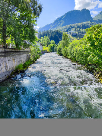 Mountain river in the Swiss Alps. A small river flows through the Norway Scandinavia Europe.