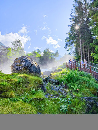 Waterfall in the valley, Geiranger fjord and mountains in summer, Norway.の写真素材