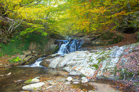 Waterfall in the autumn forest. Autumn landscape with a waterfall. near Zletovo,  Macedoniaの写真素材