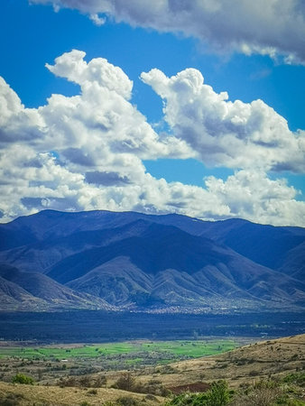 Landscape of mountains and blue sky with white clouds. Copy space. Kocani, Macedoniaの写真素材