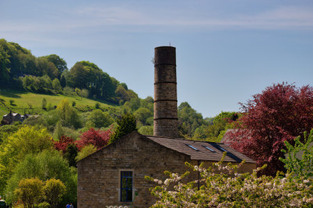 Old brick chimney on a hillside in the English countryside.の写真素材
