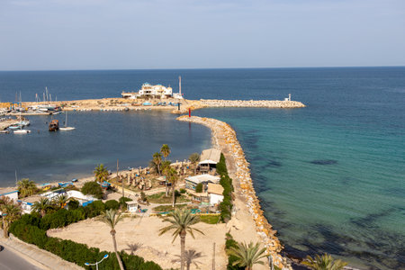 View from the height of the promenade to the bay of the resort town of Monastir, Tunisiaの写真素材
