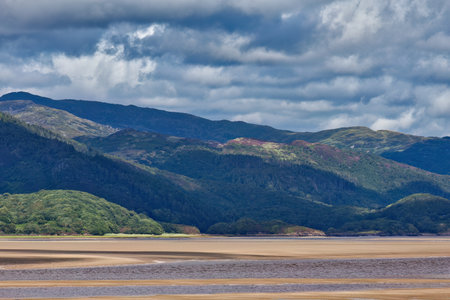 Landscape of the wales Highlands in the summer with a stormy sky in Barmouth, Wales, UKの写真素材
