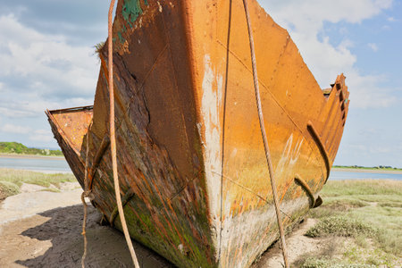 Abandoned fishing boat on the beach in Fleetwood, north-west, lancashire, ukの写真素材