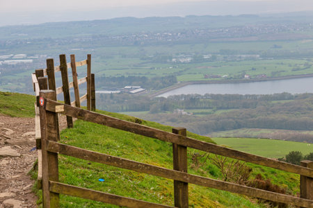 Wooden fence on a hillsidein Rivington, Lancashire, UKの写真素材