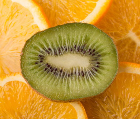 Kiwi on the orangesの写真素材
