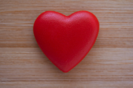 Red heart on wooden