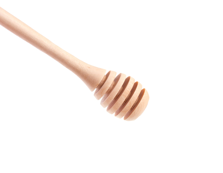 Honey dipper isolated on the white background. Device for dipping honey.の写真素材
