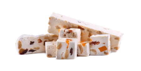 Nut nougat with dried fruit, sweet candy isolated on white background.の写真素材