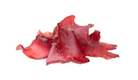 Pork jerky isolated on white background. Pieces of dry meat.の写真素材