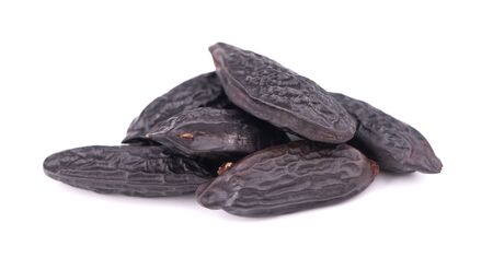 Tonka beans isolated on white background. Bean of Dipteryx odorata, cumaru or kumaru. Fresh aroma tonka beansの写真素材