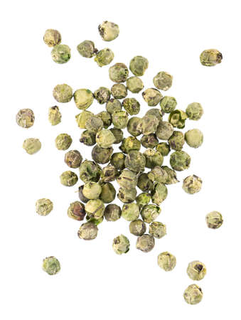 Green peppercorns isolated on white background. organic spice. Dry green pepper grain. top view