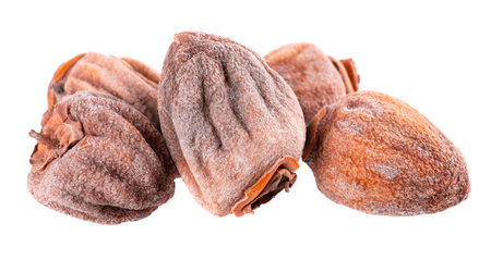 Dried persimmon isolated on white background. Dried fruit snack.の写真素材