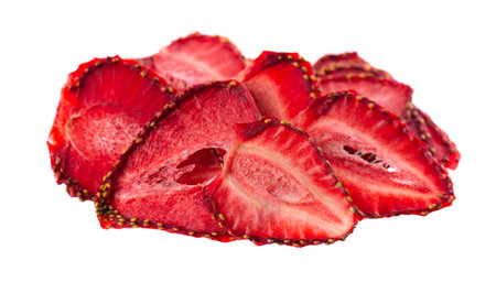 Dried strawberry slices isolated on white background. Dehydrated strawberries chips. Clipping path.の写真素材