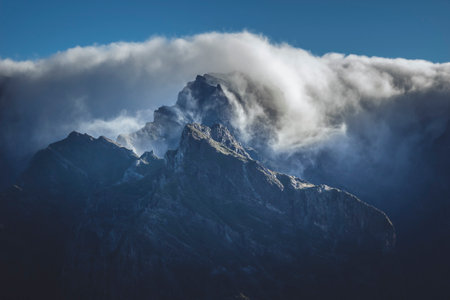 Clouds over the mountains, during Pico Grande hike. Wood, winter.の写真素材