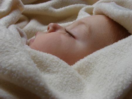 Sleeping Baby wrapped in a warm fleece