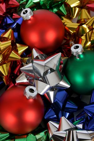 Variety of colorful Christmas decorations and bows