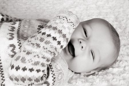 Cute two month old smiling baby girl の写真素材