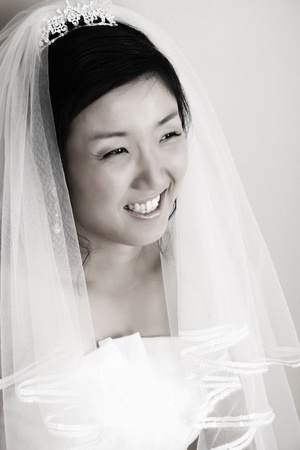 Beautiful Korean bride wearing a traditional wedding gownの写真素材