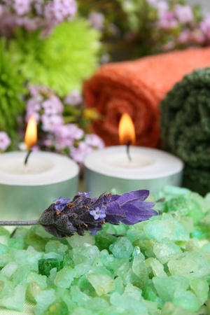 Spa Accessories setting with face cloths, jewelery and flowers の写真素材