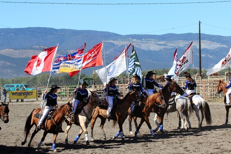 MERRITT, B.C. CANADA - SEPTEMBER 3: Equestrian drill team at The 52nd Annual Pro Rodeo September 3, 2011 in Merritt British Columbia, Canadaのeditorial素材