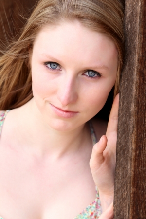 Beautiful blond model outdoors in rural setting natural lightの写真素材
