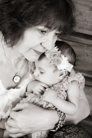 Grandmother with a three month old baby girlの写真素材