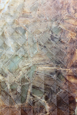Abstract brown stain glass window with texture