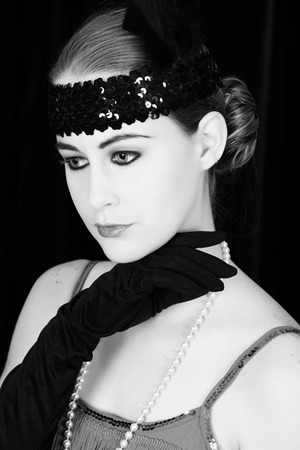 Beautiful young female in 1920 style attire