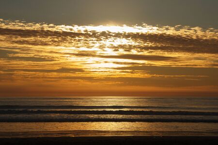 beautiful sunset on a beach in southern spainの写真素材