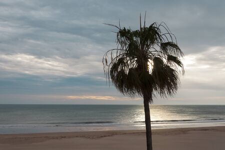 beautiful sunset on cadiz beach in southern spainの写真素材