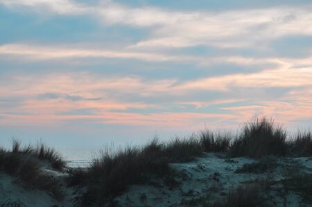 beautiful and colorful sunset on cadiz beach in southern spainの写真素材